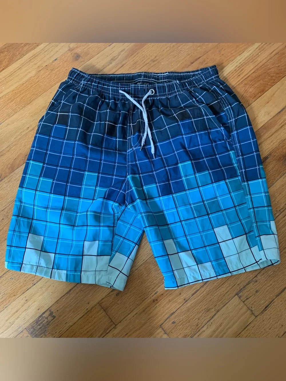 Blue and white plaid polyester swim trunks with gradient effect size XL